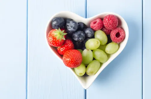 fruits in heart-shaped dish